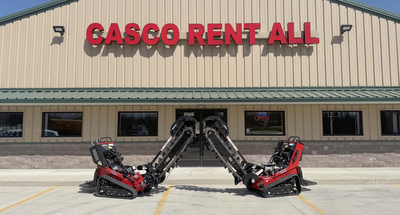 small walk behind trenchers parked in front of Casco Rent All